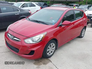 2014 Hyundai Accent GS with VIN KMHCT5AE1EU172027, listed as a IAAI auction lot 42165016 with 140,943 mi miles and . Bid and sale history available at carsss.com. Image 2.