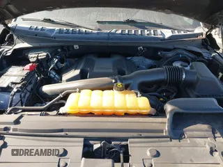 2018 Ford F-150 XL with VIN 1FTEW1EG1JFC31794, listed as a IAAI auction lot 41304111 with 129,058 mi miles and . Bid and sale history available at carsss.com. Image 10.