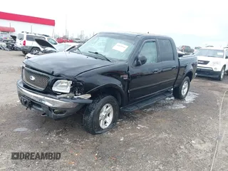 2002 Ford F-150 XLT with VIN 1FTRW08L32KD90202, listed as a IAAI auction lot 41850546 with 256,807 mi miles. Bid and sale history available at carsss.com. Image 22.