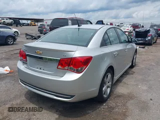 2014 Chevrolet Cruze 2LT z VIN 1G1PE5SB6E7270997, wystawiony jako IAAI lot #42323955 z przebiegiem 146 752 mil mil oraz . Historia ofert i sprzedaży dostępna na DreamBid. Obrazek 4.