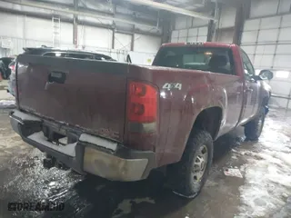 2013 GMC Sierra 2500HD Work Truck with VIN 1GT02ZCG2DZ243270, listed as a IAAI auction lot 41595304 with 125,468 mi miles. Bid and sale history available at carsss.com. Image 4.