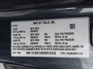 2024 Tesla Model 3 Long Range with VIN 5YJ3E1EB2RF815376, listed as a IAAI auction lot 41565549 with 10,377 mi miles and . Bid and sale history available at DreamBid. Image 9.