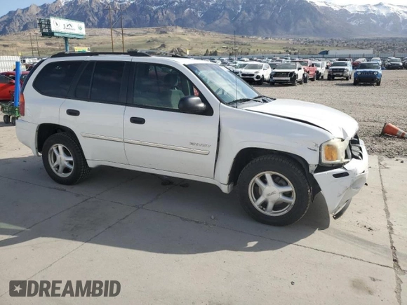 2006 GMC Envoy SLE z VIN 1GKDT13S462156541, wystawiony jako Copart lot #52500615 z przebiegiem 140 558 mil mil oraz Szkody całkowita. Historia ofert i sprzedaży dostępna na DreamBid. Obrazek 4.