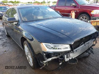 2015 Audi A8 4.0T z VIN WAU32AFD6FN022648, wystawiony jako IAAI lot #42358142 z przebiegiem 103 416 mil mil oraz . Historia ofert i sprzedaży dostępna na DreamBid. Obrazek 1.