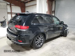 2018 Jeep Grand Cherokee Overland with VIN 1C4RJFCG1JC287784, listed as a Copart auction lot 50391255 with 105,981 mi miles and Salvage title. Bid and sale history available at DreamBid. Image 3.
