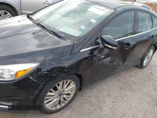 2018 Ford Focus Titanium с VIN 1FADP3N24JL252493, выставлен на аукционе IAAI как лот 41810980 с пробегом 119 998 миль миль и . История ставок и продаж доступна на DreamBid. Изображение 6.