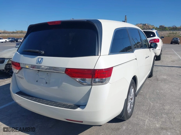 2016 Honda Odyssey EX-L with VIN 5FNRL5H65GB055916, listed as a IAAI auction lot 41980339 with 87,497 mi miles. Bid and sale history available at carsss.com. Image 4.