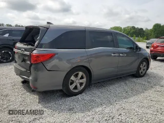 2019 Honda Odyssey EX-L z VIN 5FNRL6H72KB012691, wystawiony jako Copart lot #54739695 z przebiegiem 115 129 mil mil oraz Szkody całkowita. Historia ofert i sprzedaży dostępna na DreamBid. Obrazek 3.