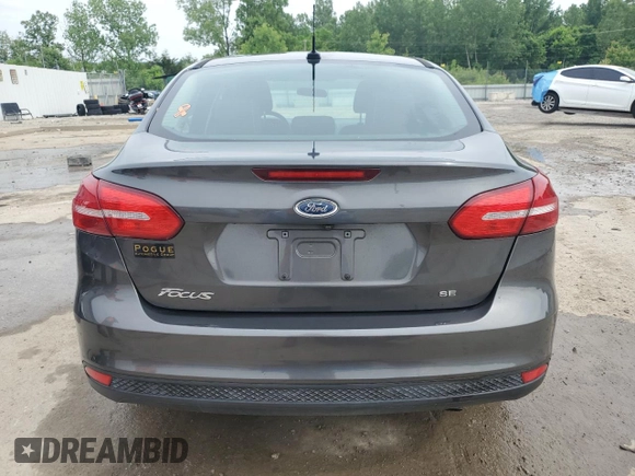 2017 Ford Focus SE с VIN 1FADP3F29HL267516, выставлен на аукционе Copart как лот 56984255 с пробегом 98 861 миль миль и Списание • Salvage title. История ставок и продаж доступна на DreamBid. Изображение 6.