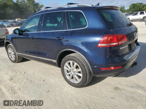 2014 Volkswagen Touareg Sport with VIN WVGEF9BP0ED005648, listed as a Copart auction lot 53230315 with 188,103 mi miles and Clean Title. Bid and sale history available at DreamBid. Image 2.