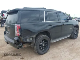 2015 GMC Yukon SLT with VIN 1GKS1BKC5FR274408, listed as a IAAI auction lot 41942157 with 165,978 mi miles. Bid and sale history available at carsss.com. Image 4.
