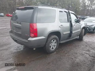 2008 GMC Yukon SLT w/4SB with VIN 1GKFC13008J141826, listed as a IAAI auction lot 41395631 with 1 mi miles. Bid and sale history available at carsss.com. Image 4.