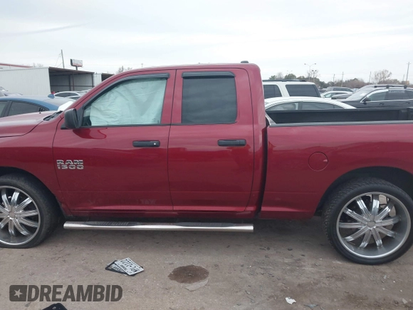 2014 Ram 1500 Tradesman with VIN 1C6RR6FG4ES454808, listed as a IAAI auction lot 41368359 with 233,684 mi miles and . Bid and sale history available at DreamBid. Image 14.