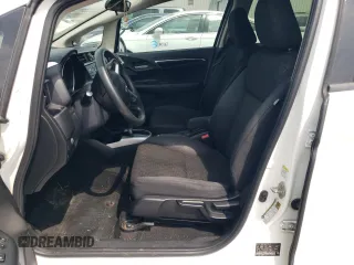 2016 Honda Fit LX with VIN JHMGK5H57GX009204, listed as a Copart auction lot 57129695 with 140,146 mi miles and Salvage title. Bid and sale history available at DreamBid. Image 7.