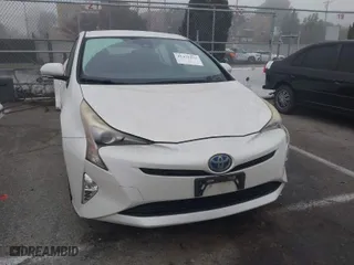 2017 Toyota Prius Two with VIN JTDKARFUXH3037751, listed as a IAAI auction lot 41471974 with 140,787 mi miles. Bid and sale history available at carsss.com. Image 13.