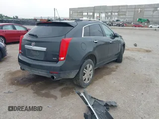 2016 Cadillac SRX Luxury Collection with VIN 3GYFNBE34GS522735, listed as a IAAI auction lot 42416899 with 142,561 mi miles and . Bid and sale history available at DreamBid. Image 4.