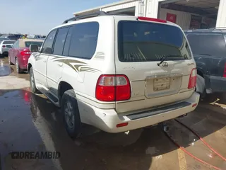 2000 Lexus LX 470 with VIN JT6HT00W5Y0080249, listed as a IAAI auction lot 41726247 with 315,707 mi miles and . Bid and sale history available at carsss.com. Image 3.