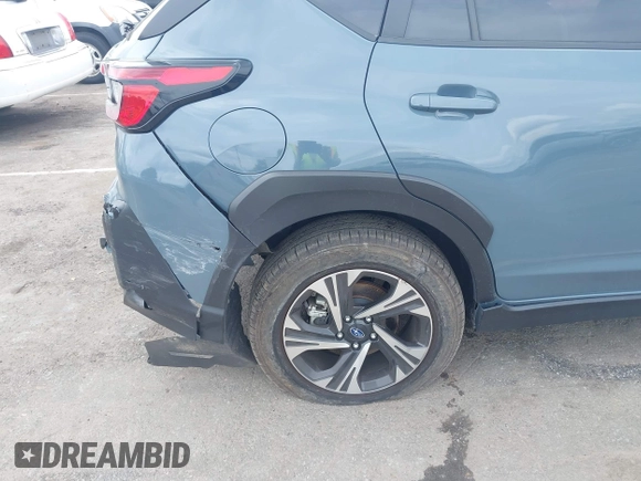 2024 Subaru Crosstrek Premium z VIN JF2GUADC7R8299418, wystawiony jako IAAI lot #42358005 z przebiegiem 21 690 mil mil oraz . Historia ofert i sprzedaży dostępna na DreamBid. Obrazek 17.