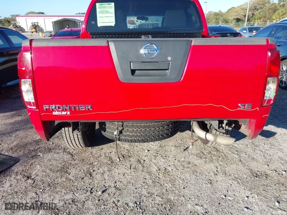 2009 Nissan Frontier SE with VIN 1N6AD07U19C419811, listed as a IAAI auction lot 41090904 with 141,119 mi miles. Bid and sale history available at carsss.com. Image 6.
