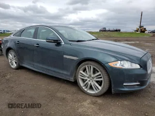 2015 Jaguar XJ Premium Luxury with VIN SAJXJ1CD3F8V88780, listed as a Copart auction lot 57488345 with 62,776 mi miles and Clean Title. Bid and sale history available at DreamBid. Image 4.