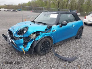 2016 MINI Convertible with VIN WMWWG5C52G3A81084, listed as a IAAI auction lot 41954333 with 78,558 mi miles and . Bid and sale history available at DreamBid. Image 17.