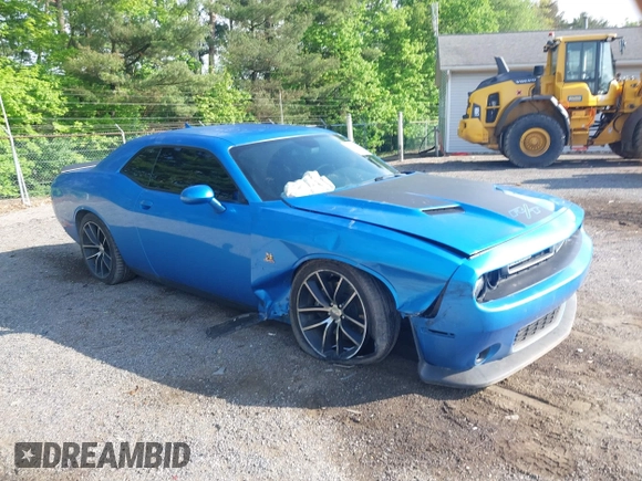 2016 Dodge Challenger R/T Scat Pack z VIN 2C3CDZFJ9GH100372, wystawiony jako IAAI lot #42221915 z przebiegiem 66 896 mil mil oraz . Historia ofert i sprzedaży dostępna na DreamBid. Obrazek 1.