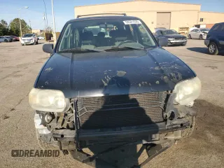 2005 Ford Escape XLS Value with VIN 1FMYU02Z55KB94437, listed as a Copart auction lot 50581635 with 265,079 mi miles and Salvage Title. Bid and sale history available at carsss.com. Image 5.