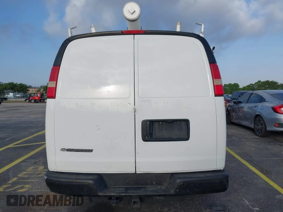 2013 Chevrolet Express Cargo with VIN 1GCWGFCG2D1144523, listed as a IAAI auction lot 41729515 with 282,755 mi miles and . Bid and sale history available at DreamBid. Image 16.