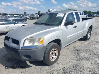 2007 Mitsubishi Raider LS with VIN 1Z7HC22K57S162987, listed as a IAAI auction lot 42015748 with 100,919 mi miles. Bid and sale history available at carsss.com. Image 2.