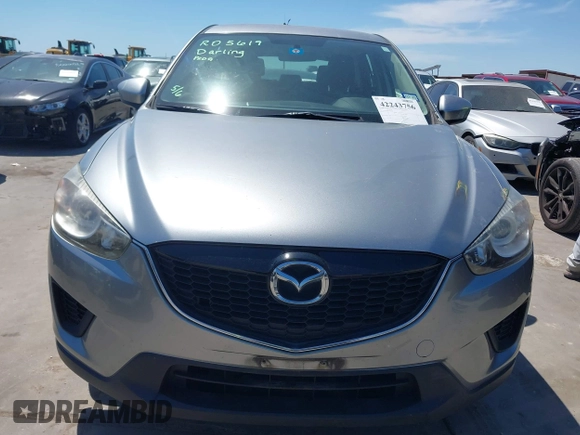 2014 Mazda CX-5 Sport with VIN JM3KE2BE7E0371203, listed as a IAAI auction lot 42243756 with 121,534 mi miles and . Bid and sale history available at DreamBid. Image 13.