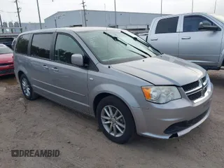 2014 Dodge Grand Caravan SE with VIN 2C4RDGBG2ER188015, listed as a IAAI auction lot 41841205 with Not Provided miles and . Bid and sale history available at DreamBid. Image 1.