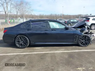 2021 BMW 7 Series 740i z VIN WBA7T2C03MCF58569, wystawiony jako IAAI lot #41662350 z przebiegiem 41 303 mil mil oraz . Historia ofert i sprzedaży dostępna na DreamBid. Obrazek 13.