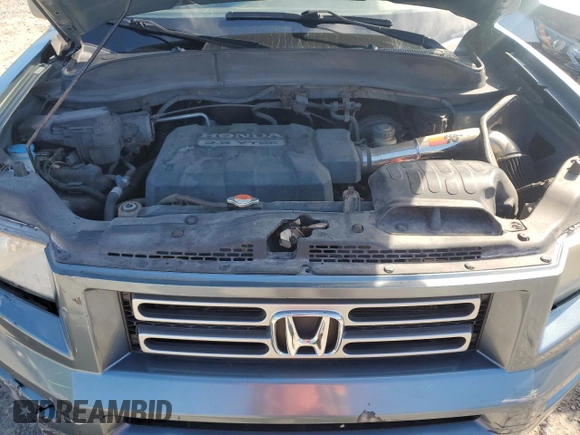 2006 Honda Ridgeline RTL with VIN 2HJYK16556H545357, listed as a Copart auction lot 70656694 with 153,668 mi miles and Salvage Title. Bid and sale history available at carsss.com. Image 11.
