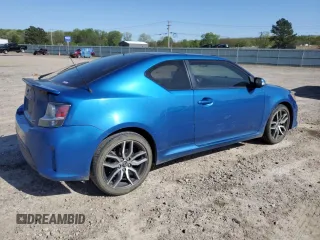 2016 Scion tC z VIN JTKJF5C75GJ022534, wystawiony jako Copart lot #52254005 z przebiegiem 103 812 mil mil oraz Szkoda całkowita • Salvage title. Historia ofert i sprzedaży dostępna na DreamBid. Obrazek 3.