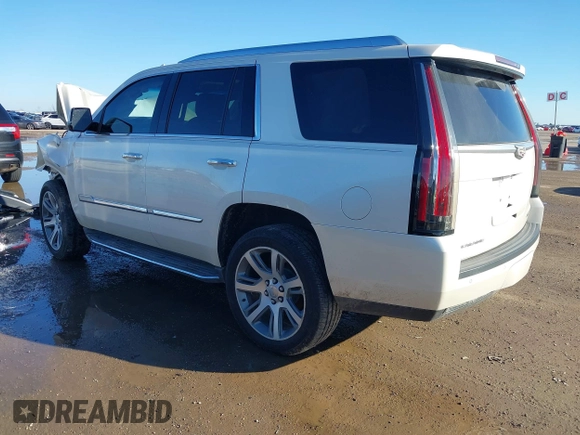 2015 Cadillac Escalade Luxury z VIN 1GYS3MKJXFR651714, wystawiony jako IAAI lot #41205449 z przebiegiem 129 066 mil mil oraz . Historia ofert i sprzedaży dostępna na DreamBid. Obrazek 3.