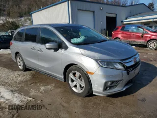2019 Honda Odyssey EX with VIN 5FNRL6H59KB074264, listed as a Copart auction lot 87653495 with 104,422 mi miles and Salvage Title. Bid and sale history available at carsss.com. Image 4.