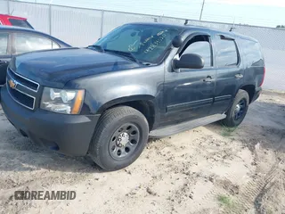 2012 Chevrolet Tahoe Commercial z VIN 1GNLC2E08CR196981, wystawiony jako IAAI lot #42834520 z przebiegiem 221 592 mil mil oraz . Historia ofert i sprzedaży dostępna na DreamBid. Obrazek 17.