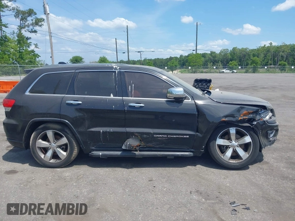 2015 Jeep Grand Cherokee Overland with VIN 1C4RJFCT9FC859740, listed as a IAAI auction lot 42187933 with 231,481 mi miles. Bid and sale history available at carsss.com. Image 13.