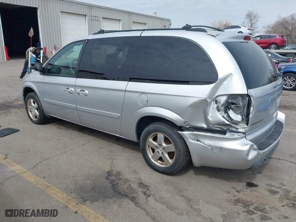 2006 Dodge Grand Caravan SXT with VIN 2D4GP44L26R664596, listed as a IAAI auction lot 41846643 with 235,554 mi miles. Bid and sale history available at carsss.com. Image 3.