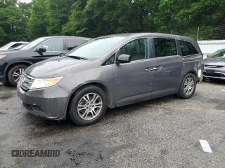 2013 Honda Odyssey EX z VIN 5FNRL5H41DB077728, wystawiony jako Copart lot #58000975 z przebiegiem 168 017 mil mil oraz Szkoda całkowita • Salvage title. Historia ofert i sprzedaży dostępna na DreamBid. Obrazek 1.