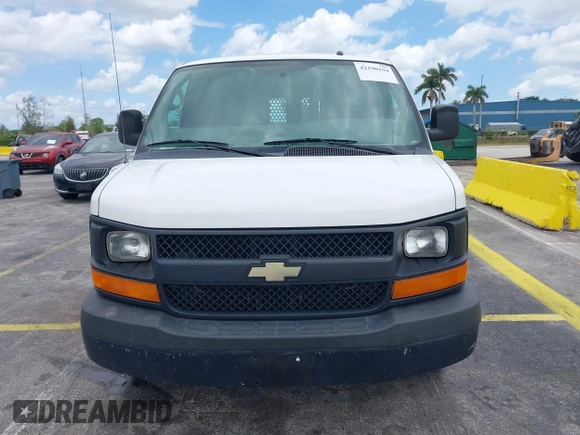 2014 Chevrolet Express Cargo Van with VIN 1GCWGFFA2E1111014, listed as a IAAI auction lot 42190194 with 97,172 mi miles. Bid and sale history available at carsss.com. Image 12.
