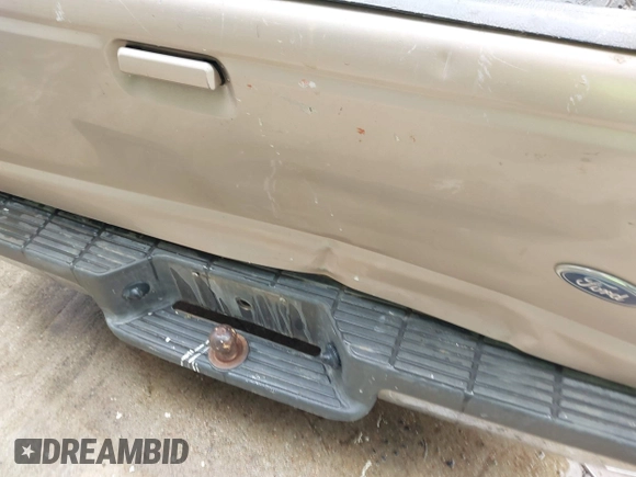 1998 Ford Ranger XL with VIN 1FTYR14UXWTA00557, listed as a IAAI auction lot 42121842 with 152,365 mi miles and . Bid and sale history available at DreamBid. Image 14.