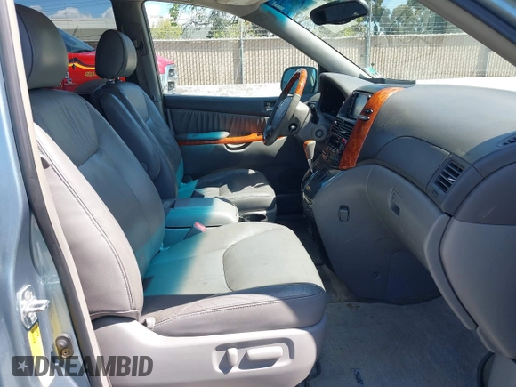 2006 Toyota Sienna XLE with VIN 5TDZA22CX6S555163, listed as a IAAI auction lot 41936624 with 230,825 mi miles. Bid and sale history available at carsss.com. Image 5.