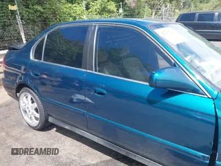 1997 Honda Civic LX z VIN 2HGEJ6671VH574878, wystawiony jako IAAI lot #42332735 z przebiegiem 246 181 mil mil oraz . Historia ofert i sprzedaży dostępna na DreamBid. Obrazek 13.