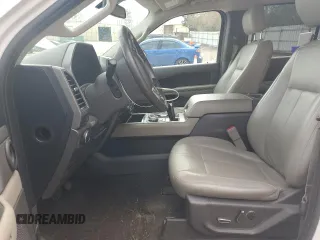 2019 Ford Expedition XLT with VIN 1FMJU1HT7KEA71047, listed as a Copart auction lot 47648145 with 125,601 mi miles and Salvage Title. Bid and sale history available at carsss.com. Image 7.