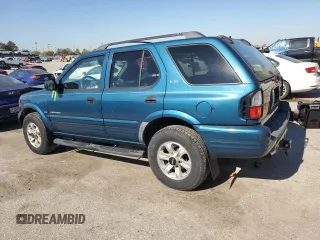 2001 Isuzu Rodeo S with VIN 4S2DM58W914301991, listed as a Copart auction lot 76518844 with 165,789 mi miles and Salvage Title. Bid and sale history available at DreamBid. Image 2.