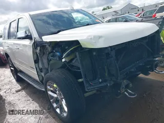 2015 Chevrolet Tahoe LTZ z VIN 1GNSKCKCXFR734734, wystawiony jako IAAI lot #42183620 z przebiegiem 178 587 mil mil oraz . Historia ofert i sprzedaży dostępna na DreamBid. Obrazek 1.