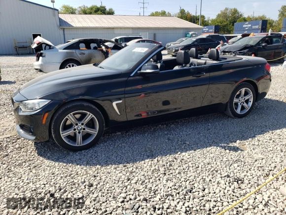 2014 BMW 4 Series 428i xDrive with VIN WBA3T1C50EPS98014, listed as a Copart auction lot 72327884 with 124,421 mi miles and Salvage Title. Bid and sale history available at carsss.com. Image 1.
