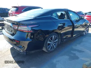 2020 Nissan Maxima SV with VIN 1N4AA6CV2LC363890, listed as a IAAI auction lot 41429411 with 77,718 mi miles and . Bid and sale history available at DreamBid. Image 4.