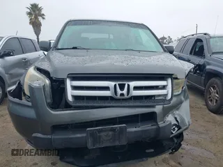 2007 Honda Pilot EX with VIN 2HKYF18497H500458, listed as a IAAI auction lot 41784273 with 114,454 mi miles. Bid and sale history available at carsss.com. Image 12.